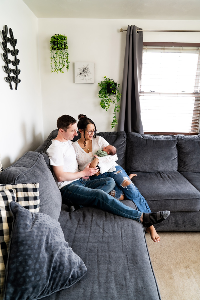 Newborn posed with props Pittsburgh
